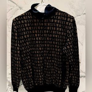 MOSCHINO Logo-Print TurtleNeck Sweater.